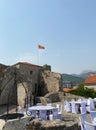 Budva. Flag of Montenegro on the Citadel roof top