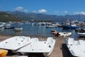 Budva, Montenegro, August 15 2022 Adriatic sea, coast, mountains, sea ripples. Boats and ships are moored to the Royalty Free Stock Photo