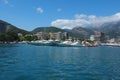 Budva, Montenegro, August 15 2022 Adriatic sea, coast, mountains, sea ripples. Boats and ships are moored to the Royalty Free Stock Photo