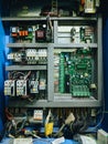 Budva, Montenegro - 01 august 2020: Elevator control board. Industrial microcircuit, printed motherboard with