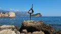 Budva Montenegro 8.15.22 Beautiful bronze sculpture of dancer girl, frozen in graceful pose and dancing. Mogren beach