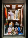 Budva, Montenegro - 25 december 2022: Shop window with colorful women scarves, shawls and capes