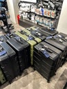 Budva, Montenegro - 18 october 2023: Travel suitcases on wheels stand on the floor in the store