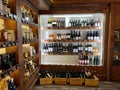 Budva, Montenegro - 01.08.22: Variety of bottles with wines and cognacs stand on shelves in a store