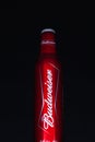 Budweiser brand beer bottle on black studio background