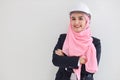 Bueautiful engineer muslim young asian woman wearing blue suit smiling confident in studio. Isolated white background portrait Royalty Free Stock Photo