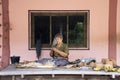 Thai old women made and working bamboo handmade for show traveler people at house in Life Community Museum at So Phisai city on