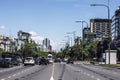 Buenos Aires Avenida 9 de Julio obelisk during the day with advertising signs and automobile traffic