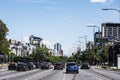 Buenos Aires Avenida 9 de Julio obelisk during the day with advertising signs and automobile traffic