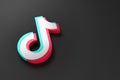 Buenos Aires, Argentina - December 12th, 2021: Tiktok icon on dark background. 3d illsutration