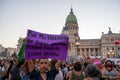 Woman holding a protest poster on International march for women's day