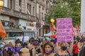 Woman holding a protest poster on International march for women's day