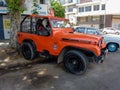 AMC orange off-road Jeep CJ7 Renegade 4x4 1976-1986. Willys. Expo Warnes 2021 classic car show.