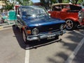 blue Fiat 128 sedan four door small family car 1970s. Expo Warnes 2021 classic car show. Copyspace