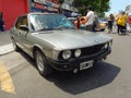 Executive luxury gray BMW 5 Series sedan 1980s. Expo Warnes 2021 classic car show.