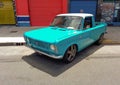 light blue Fiat 128 pickup small utility car 1970s. Expo Warnes 2021 classic car show. Copyspace