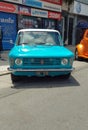 light blue Fiat 128 sedan four door classic small family car 1970s. Expo Warnes 2021. Copyspace