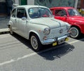 white Fiat 600 sedan two door rear engined unibody circa 1970. Expo Warnes 2021 classic car show