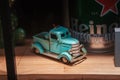 BUENOS AIRES, ARGENTINA - Oct 10, 2019: Closeup shot of a small vintage toy car on a wooden surface