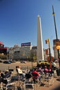 Buenos Aires Corrientes Avenue and subway entrance obelisco with people drinking coffee in a city bar