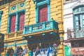 BUENOS AIRES - JANUARY 31, 2018: Colorful area in La Boca neighborhoods in Buenos Aires. Street is a major tourist attraction & t