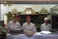 Buenos Aires State/Argentina 06/25/2014.Workers in the kitchen oven 2 at the Pizzeria GÃÂ¼errin the most famous PIZZA SHOP in Bueno Royalty Free Stock Photo