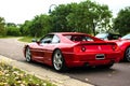 Rear view of 90s supercar. Ferrari F355 on road. Royalty Free Stock Photo