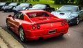 Rear view of 90s supercar. Ferrari F355 on road. Royalty Free Stock Photo