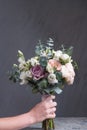 Buequet of white, pink and purple roses close up for bride in the happiest day