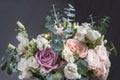 Buequet of white, pink and purple roses close up for bride in the happiest day