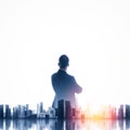 Buesinessman wearing classic suit and looking cityscape. Double exposure Royalty Free Stock Photo