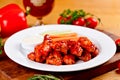 Buffalo chicken wings with blue cheese dip, carrots and celery sticks on white plate Royalty Free Stock Photo