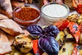 Buffalo chicken wings with cayenne pepper sauce served hot with celery sticks and carrot sticks with blue cheese Royalty Free Stock Photo