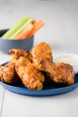 Buffalo chicken wings with celery carrot sticks Royalty Free Stock Photo