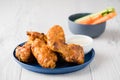 Buffalo chicken wings with celery carrot sticks Royalty Free Stock Photo