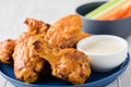 Buffalo chicken wings with celery carrot sticks Royalty Free Stock Photo