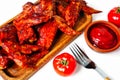 Buffalo grilled chicken wing with tomato pepper sauce isolated on white background Royalty Free Stock Photo