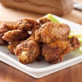 Buffalo wings with celery closeup Royalty Free Stock Photo