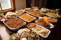 buffet full of burritos, tacos, and nachos for guests to choose from