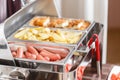 Buffet heated trays ready for service. Breakfast in hotel smorgasbord. Royalty Free Stock Photo