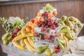 Buffet line assorted Fruit platter of strawberries Raspberry Grapes Blueberries Peaches Apricot Banana Cherry Cherries Royalty Free Stock Photo