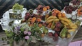 Buffet line assorted Fruit platter of strawberries Raspberry Grapes Blueberries Peaches Apricot Banana Cherry Cherries