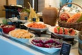 Buffet meal at a hotel, continental breakfast, friuts and yogurt on the table