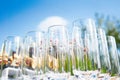 Buffet in the open air - empty glasses on the background of cold snacks against the sky Royalty Free Stock Photo