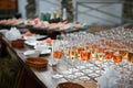 Buffet outdoor with glasses of champagne and wine. Royalty Free Stock Photo