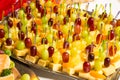 Buffet with pineapple and grapes appetizers and other fruits in restaurant Royalty Free Stock Photo