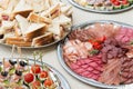 The buffet at the reception. Assortment of canapes. Banquet service. Catering, snacks with different types of cheese and meat Royalty Free Stock Photo