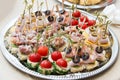 The buffet at the reception. Assortment of canapes. Banquet service. Catering, snacks with different types of cheese and meat Royalty Free Stock Photo