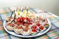 The buffet at the reception. Assortment of canapes on a table. Banquet service. Catering food, snacks with different types of Royalty Free Stock Photo