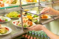 Buffet self service canteen display fresh salad